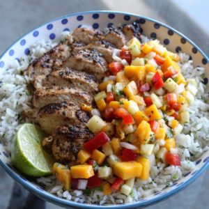 Grilled cilantro lime chicken with a fresh pineapple mango salsa and cilantro rice